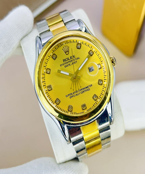 Rolex watch with yellow face and silver and gold band on white background