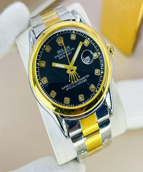 Luxury watch with gold and silver band on a white background