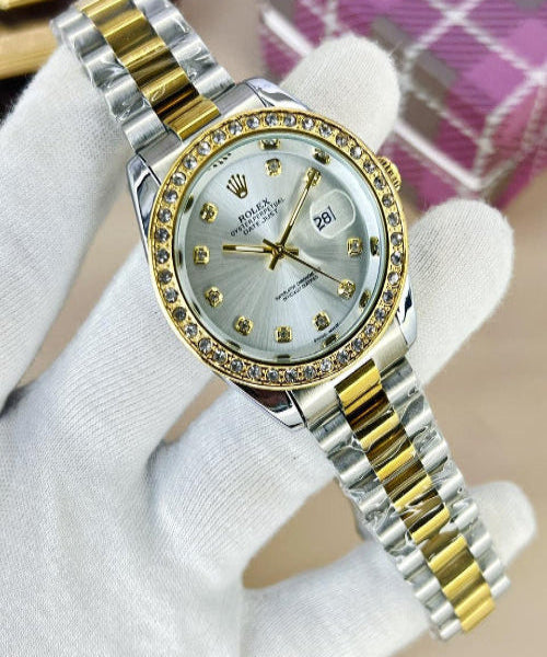 Luxury watch with silver and gold band on a white background