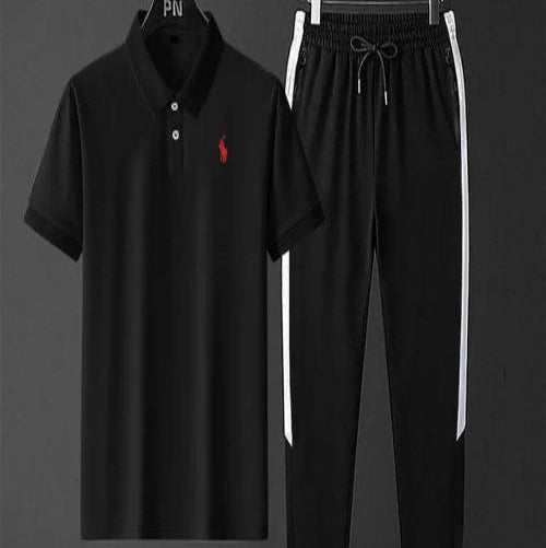 Black polo shirt and pants set with a red logo on a gray background