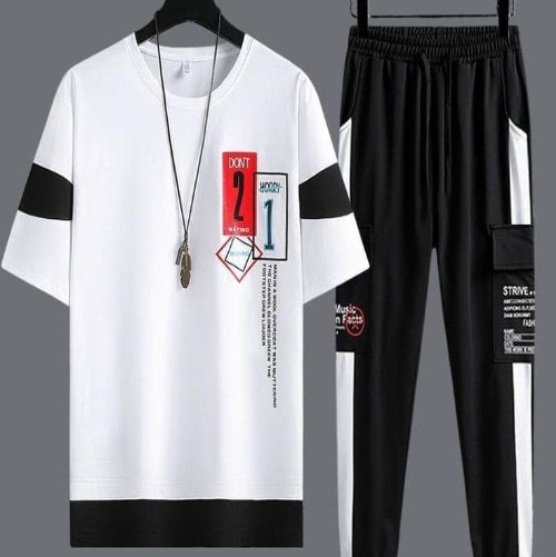 White and black outfit with text and graphics on a gray background